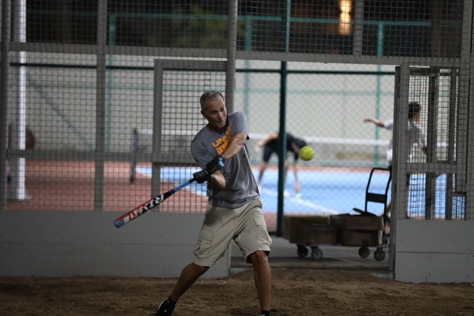 Softball player batting at Red Sea Sports Club